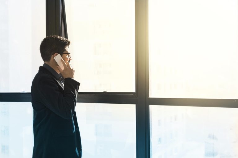 Man, cell phone, tuxedo — "Discover Adelaide's Best IT Support: Reliable and Efficient Services"