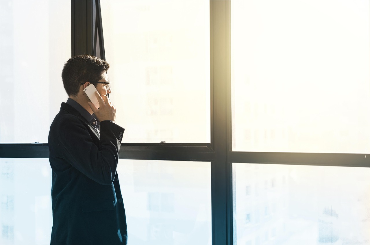 Man, cell phone, tuxedo — "Discover Adelaide's Best IT Support: Reliable and Efficient Services"