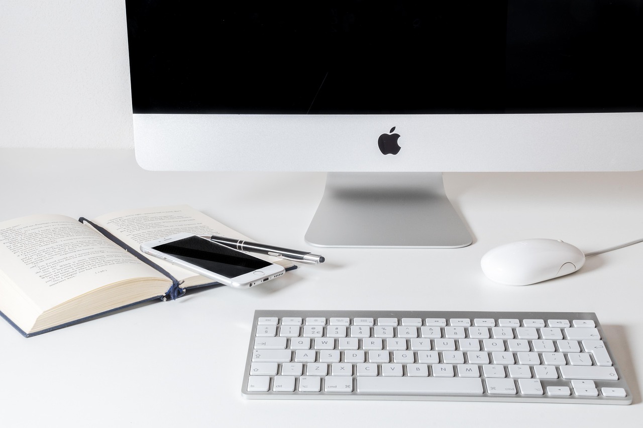 Work, computer, apple — Employee Leasing Pros and Cons