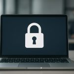 A laptop displaying a padlock icon on its screen, symbolizing security and privacy measures in digital communications.